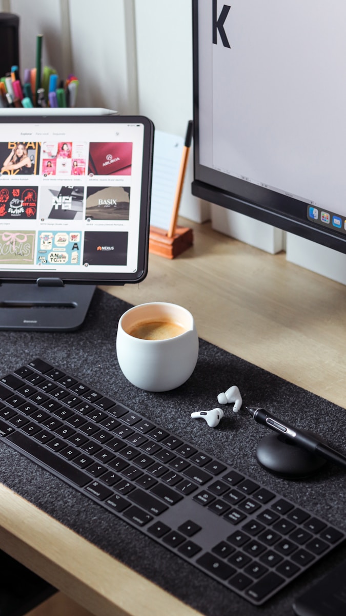 A desktop computer sitting on top of a wooden desk